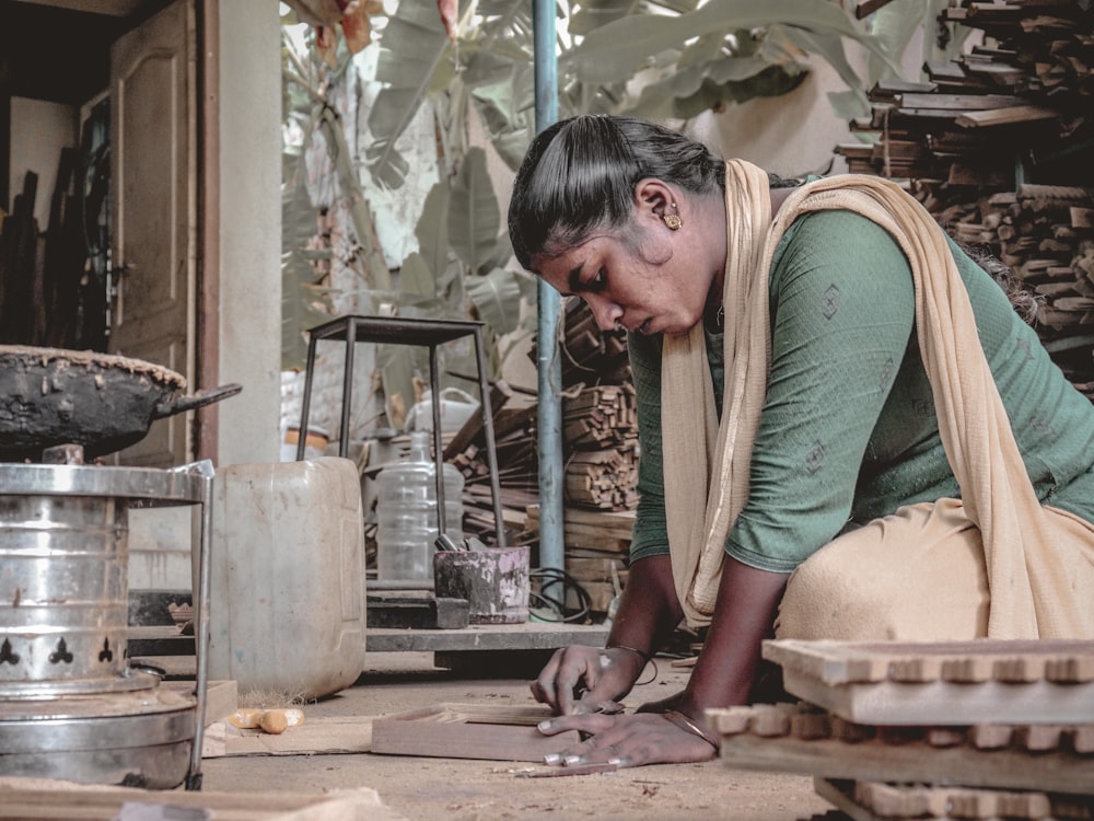 A mentor visiting a founder's workshop